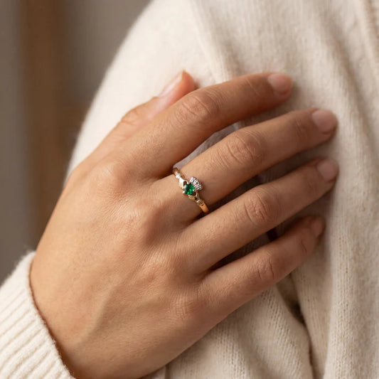 Facet 10K. Emerald Claddagh Ring